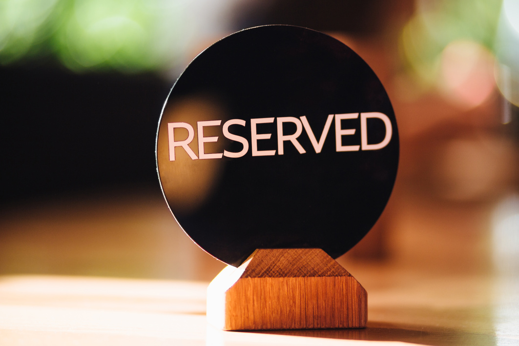 Reserved Sign on Restaurant Table